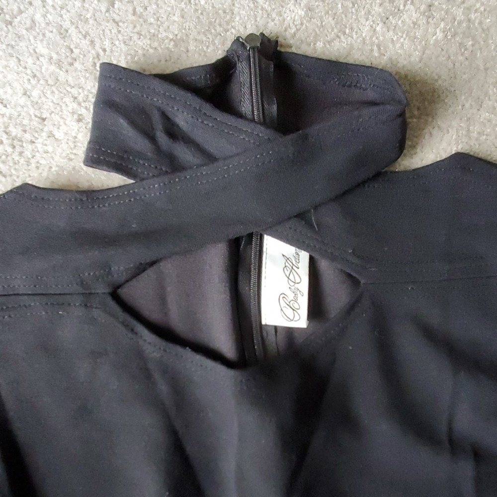 Black long sleeve top with cut out design
